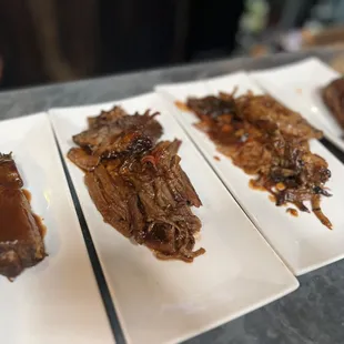 Assorted sides of BBQ meats