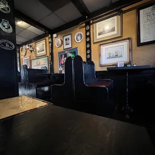 Inside pub they have single booth seats and regular booth seating along with tables.