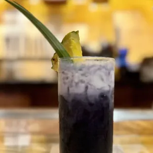 Varietal 34- Kohana rum, pineapple juice, giffard orgeat, citrus juice, extract of ube with a coconut milk float. $16