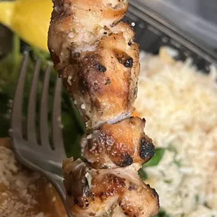 Cold, reheated chicken souvlaki. Hard as a rock on the outside. Dried up.