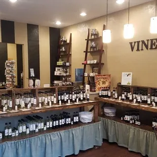 a wine bar with bottles of wine