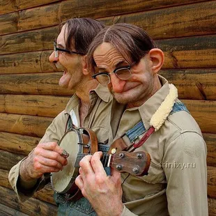 two men playing the banjo
