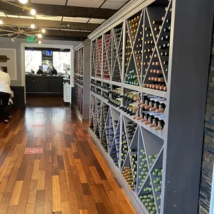 a wine rack with bottles of wine