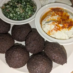 Falafel, hummus, tabouleh They look more well done than they were.