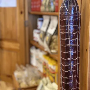 a hanging sausage in a store