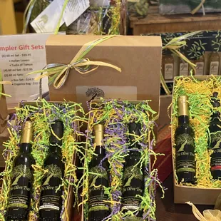 a display of olives and wine bottles