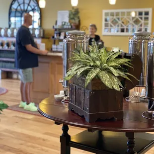 a coffee shop with people in the background