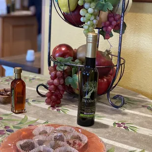 a plate of food and a bottle of wine