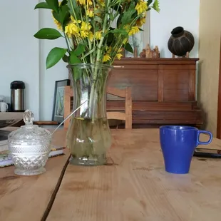 At the breakfast table waiting for my yummy German pancakes. :)