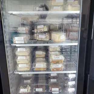 a display case full of baked goods