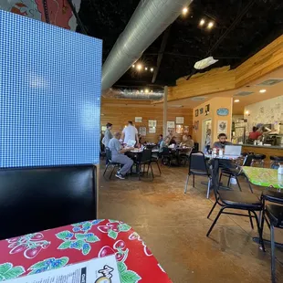 a restaurant with tables and chairs