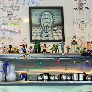 Fun drawings and toy collectibles on display