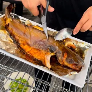 ca nuong to go large (grilled fish carved table side!)
