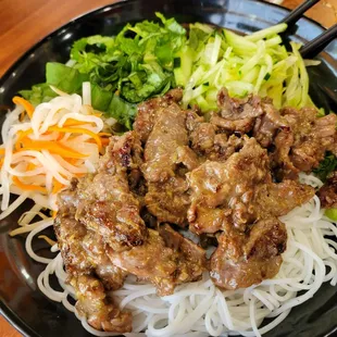Beef lemon grass vermicelli bowl. Very tasty, but extremely garlicky.