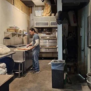 a man working in a commercial kitchen