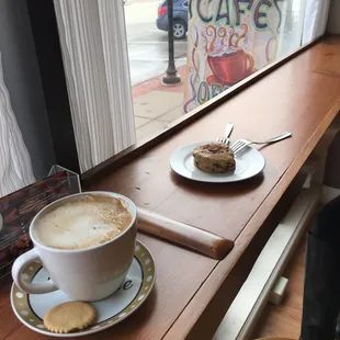 a cup of coffee and a slice of cake