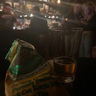 Sour cream and onion chips and a beer