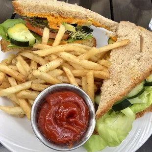 Veggie sandwich with french fries.