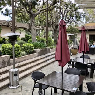 Nice comfortable courtyard with heat lamps and fountains.