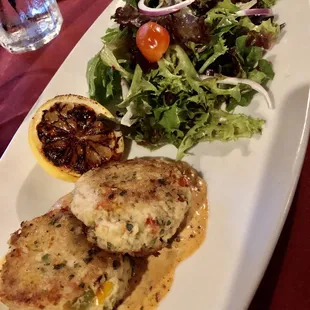 Crab Cakes and the spiciest salad I&apos;ve ever had. Too hot.