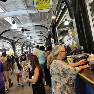 people at a food stand