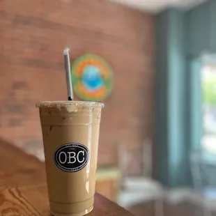 a cold beverage in a plastic cup