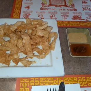 Fried wonton strips w hot mustard and duck sauce
