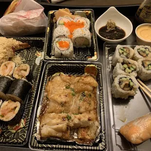 Carry out L to R Independence Roll Spicy Yellowtail California  Eel Cucumber Volcano Roll