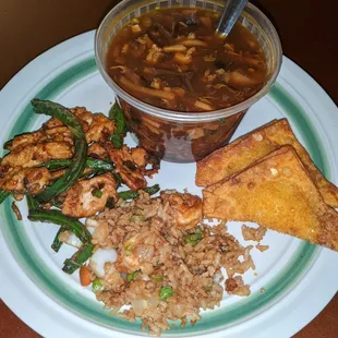 Spicy chicken and string beans, hot and sour soup, crab wontons, and shrimp fried rice