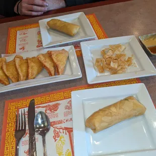 Crab Rangoon, spring rolls and complimentary wonton strips w dipping sauces