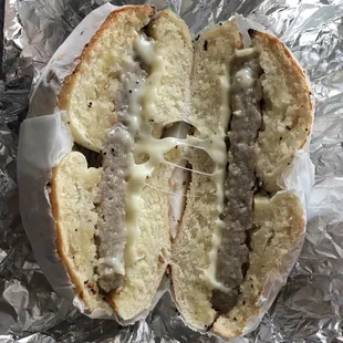 Sausage and cheese on an everything bagel