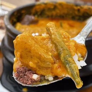 A perfect scoop of Kare Kare, rice, veggies and bagoong!