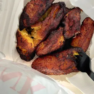 a close up of a sandwich in a styrofoam container