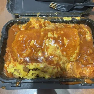 Beef burrito smothered in enchilada sauce