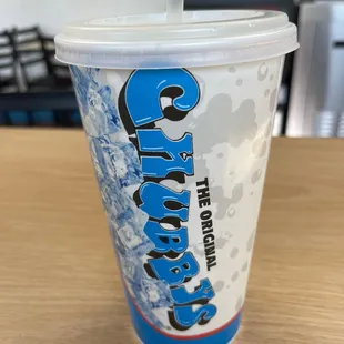a cup with a straw