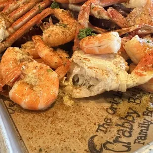 Shrimp , Snow Crab, onions, peppers, potatoes, corn on the cob and polish sausage platter