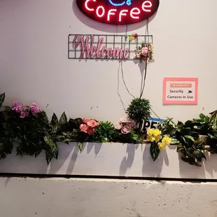 a neon sign for a coffee shop