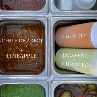 a variety of condiments in a container