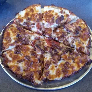 Pepperoni, mushroom, bacon create your own pizza!