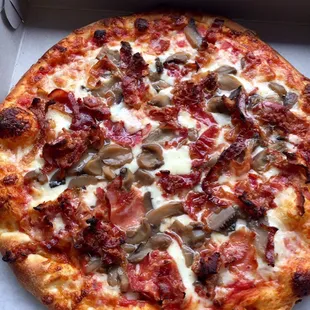 Mushroom and bacon pizza.
