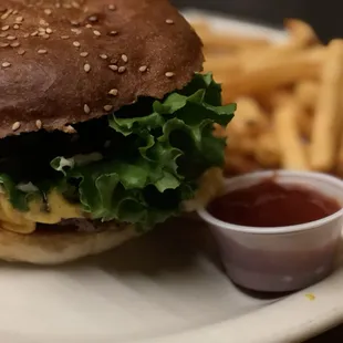 Burger and seasoned fries