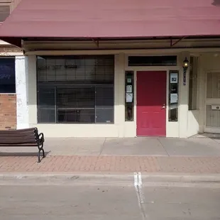 a bench in front of the building