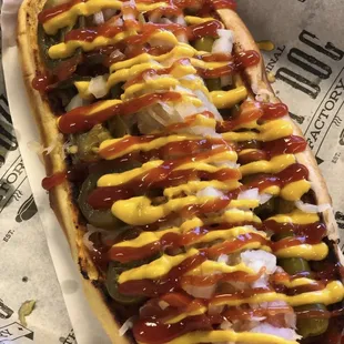 a hot dog with mustard and ketchup