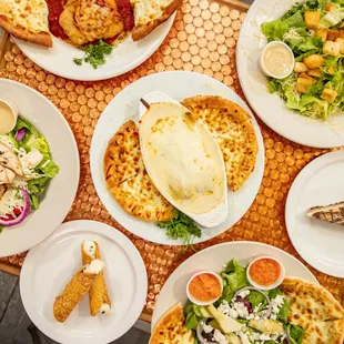 This table is full of great food. Come and join us at 417 S Rampart New Orleans la 70122 call 504-522-7552