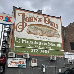the sign for the deli