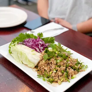 Larb salad - ground chicken, rice powder, lime juice