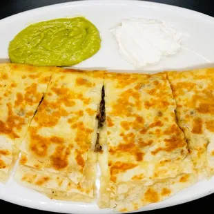 Our large quesadilla choice of Asada, Al Pastor, Carnitas or Chicken. Served with Sour Cream and Guacamole