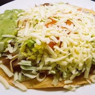 Our large tostada with choice of Asada, Al Pastor, Carnitas or Chicken.