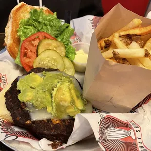 Avocado black bean burger with fries