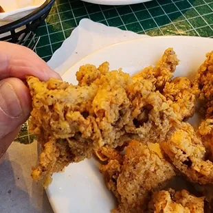2-in diameter clump of overcooked calamari